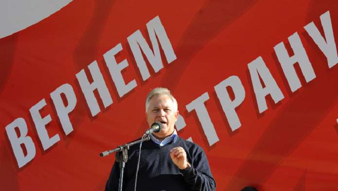 Экс-депутат КПУ вместе с террористами продавал украденные в Луганске автомобили