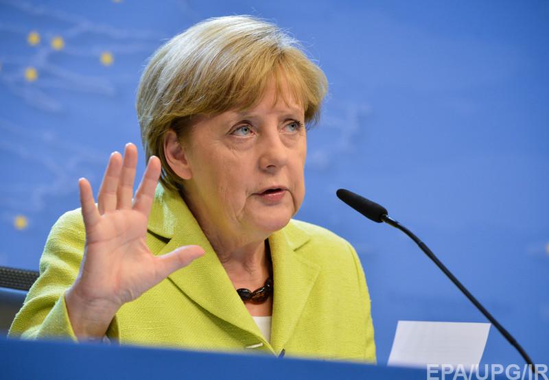 Меркель не связывает выполнение Минских договоренностей с возвращением Крыма